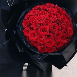 52 premium red roses in black