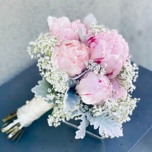 Peony and babyâ€™s breath bridal bouquet