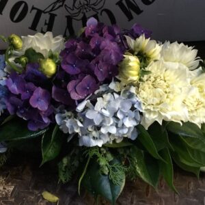 Short base funeral flower arrangement 400Lx300W 3