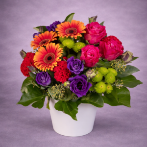 Vibrant Floral Arrangement in Ceramic Pot –