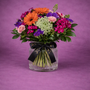 Vibrant Floral Bouquet in Glass Vase –