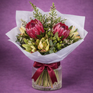 Vibrant Protea Bouquet in Elegant Vase –